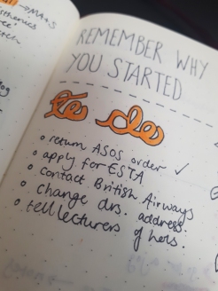 Photo from Rosie's bujo of a bright orange title saying 'to do', with note in black below